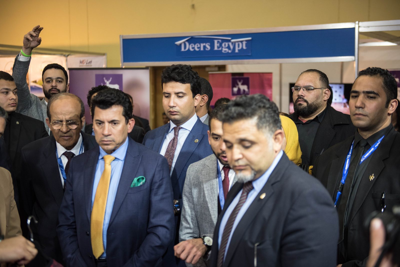 Official delegation touring exhibitor stands on the opening day