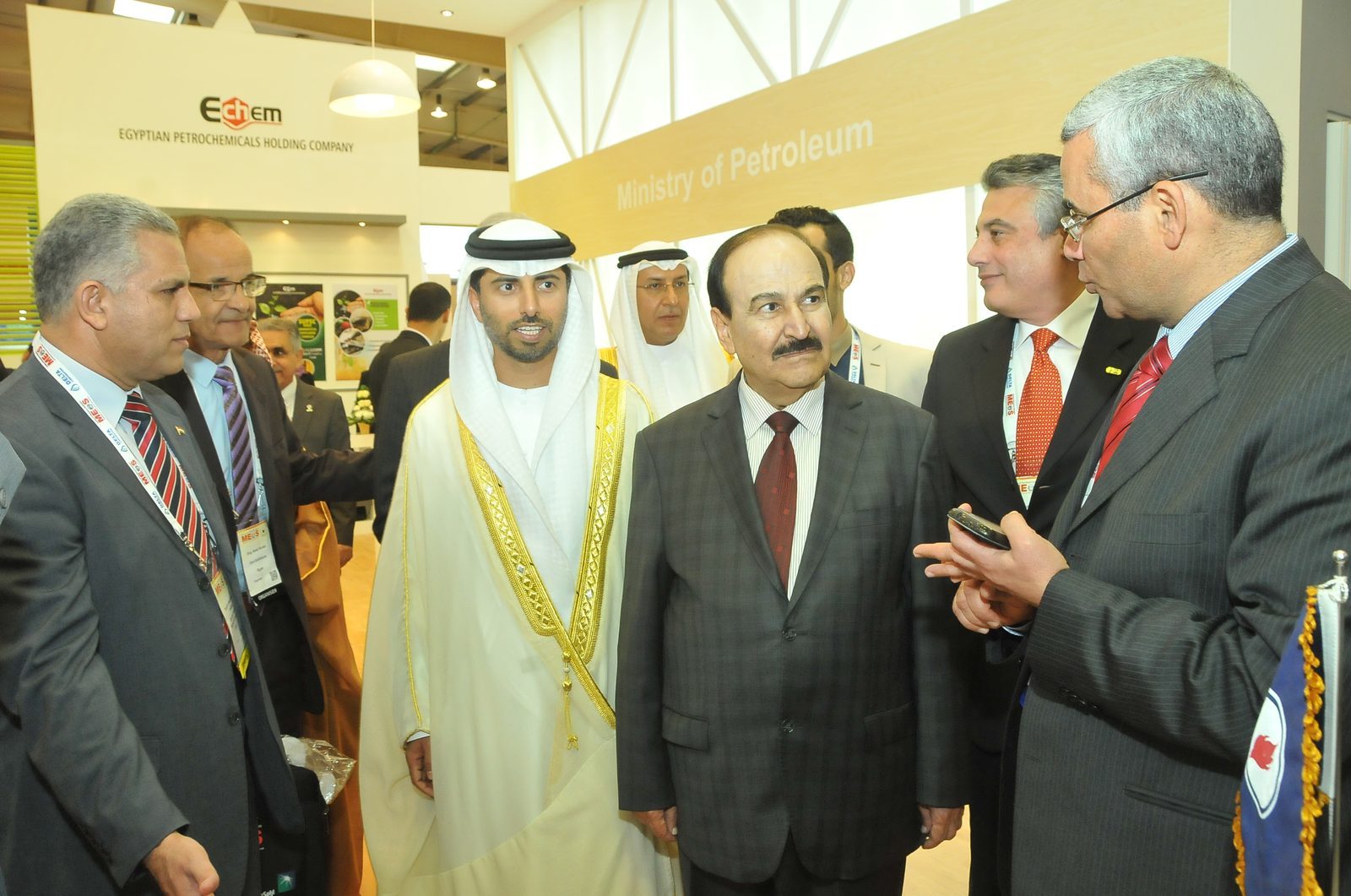 Officials touring the Egyptian pavilion, 'Ministry of Petroleum' signage behind