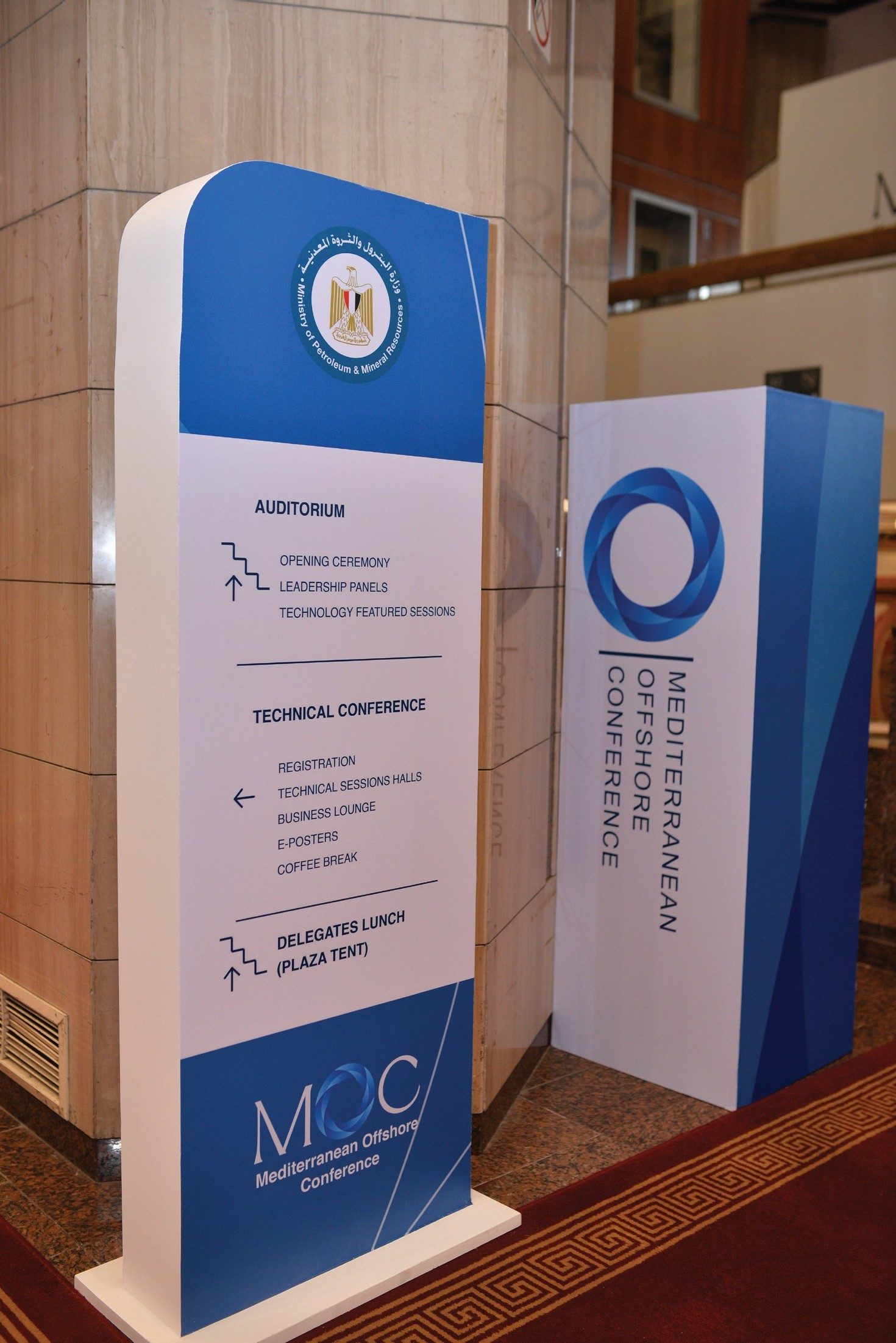 Wayfinding totem directing delegates to the auditorium, technical sessions and lunch